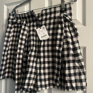 Black and white checkered print shorts
